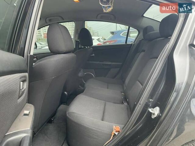 Чорний Мазда 3, об'ємом двигуна 1.6 л та пробігом 223 тис. км за 6490 $, фото 8 на Automoto.ua