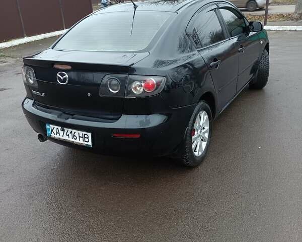 Черный Мазда 3, объемом двигателя 1.6 л и пробегом 232 тыс. км за 5850 $, фото 5 на Automoto.ua