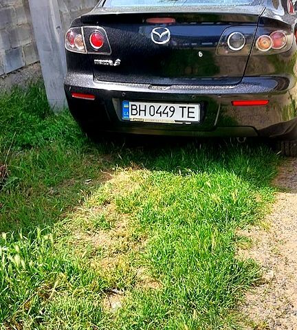 Черный Мазда 3, объемом двигателя 1.6 л и пробегом 144 тыс. км за 6000 $, фото 2 на Automoto.ua