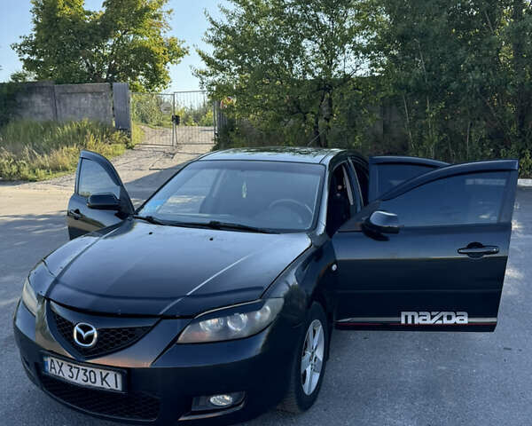 Черный Мазда 3, объемом двигателя 2 л и пробегом 150 тыс. км за 5999 $, фото 26 на Automoto.ua