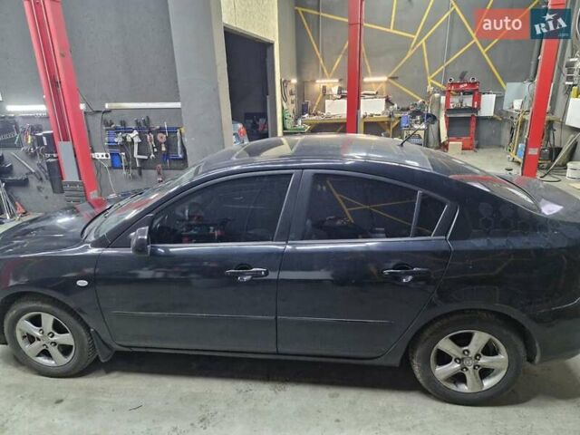 Черный Мазда 3, объемом двигателя 1.6 л и пробегом 240 тыс. км за 4200 $, фото 5 на Automoto.ua