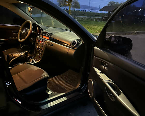 Черный Мазда 3, объемом двигателя 1.6 л и пробегом 208 тыс. км за 5500 $, фото 5 на Automoto.ua