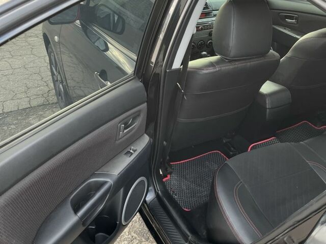 Черный Мазда 3, объемом двигателя 2 л и пробегом 166 тыс. км за 6000 $, фото 9 на Automoto.ua