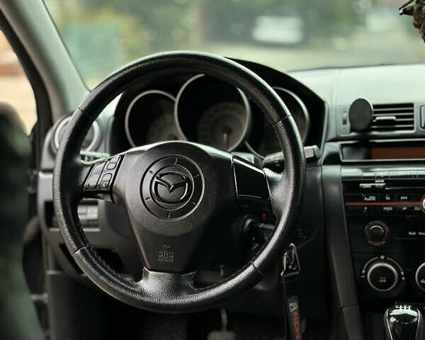 Чорний Мазда 3, об'ємом двигуна 2 л та пробігом 230 тис. км за 6800 $, фото 19 на Automoto.ua