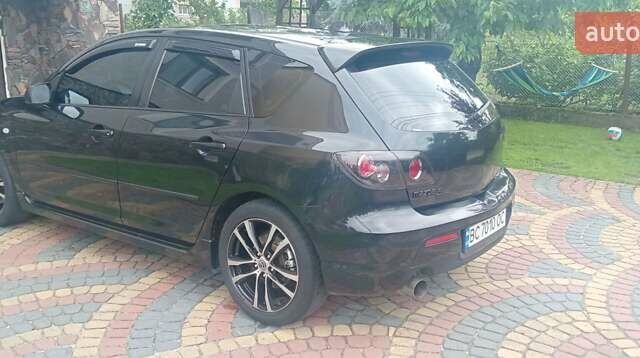 Чорний Мазда 3, об'ємом двигуна 2.02 л та пробігом 240 тис. км за 4800 $, фото 24 на Automoto.ua