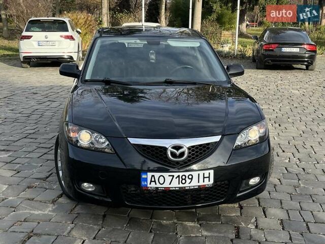 Черный Мазда 3, объемом двигателя 1.6 л и пробегом 180 тыс. км за 5700 $, фото 1 на Automoto.ua