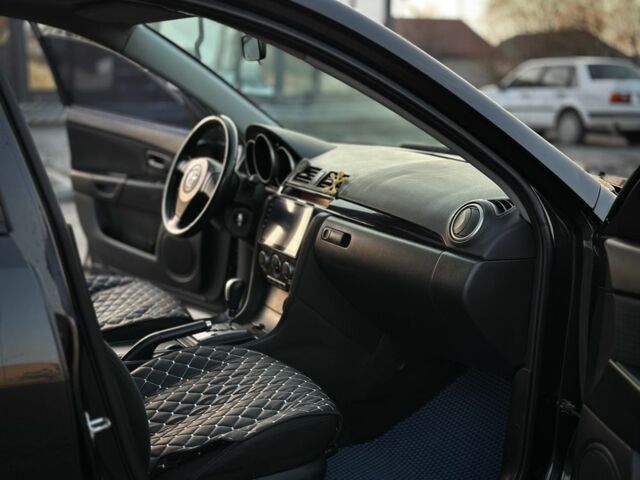 Черный Мазда 3, объемом двигателя 1.6 л и пробегом 290 тыс. км за 4400 $, фото 11 на Automoto.ua