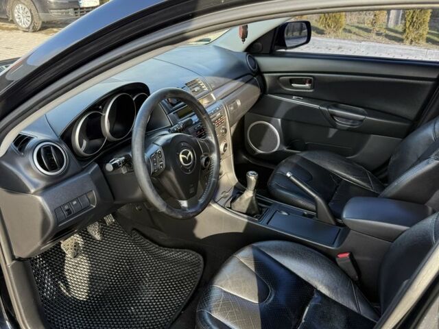 Черный Мазда 3, объемом двигателя 2 л и пробегом 154 тыс. км за 5500 $, фото 5 на Automoto.ua