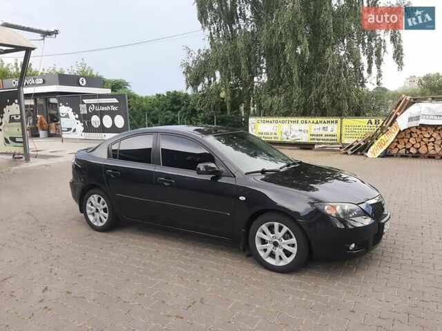Черный Мазда 3, объемом двигателя 1.6 л и пробегом 183 тыс. км за 5800 $, фото 1 на Automoto.ua