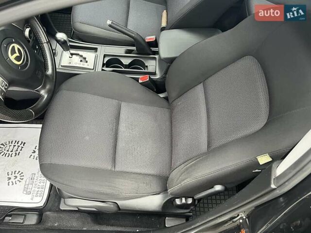 Черный Мазда 3, объемом двигателя 1.6 л и пробегом 180 тыс. км за 5700 $, фото 26 на Automoto.ua