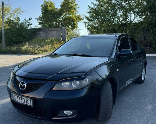 Черный Мазда 3, объемом двигателя 2 л и пробегом 150 тыс. км за 5999 $, фото 29 на Automoto.ua