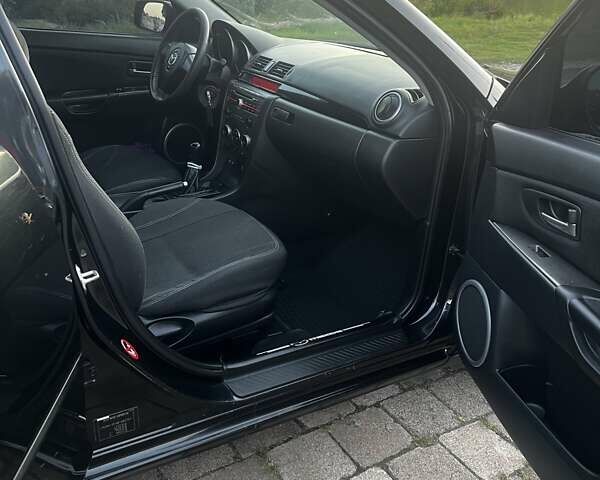 Черный Мазда 3, объемом двигателя 2 л и пробегом 330 тыс. км за 5000 $, фото 7 на Automoto.ua