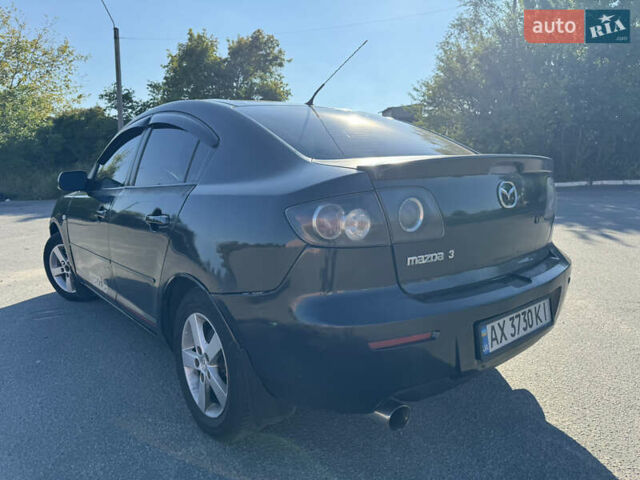 Черный Мазда 3, объемом двигателя 2 л и пробегом 150 тыс. км за 5999 $, фото 13 на Automoto.ua