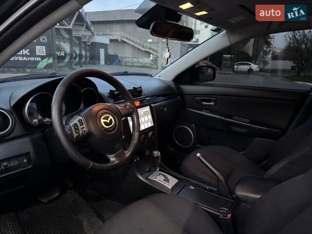 Чорний Мазда 3, об'ємом двигуна 1.6 л та пробігом 350 тис. км за 6800 $, фото 6 на Automoto.ua