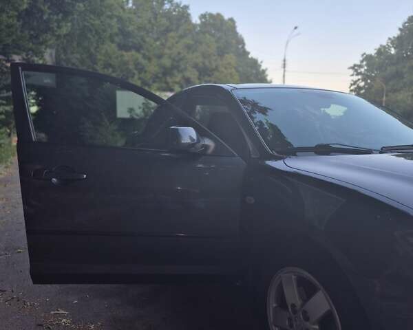 Чорний Мазда 3, об'ємом двигуна 1.6 л та пробігом 168 тис. км за 5600 $, фото 9 на Automoto.ua