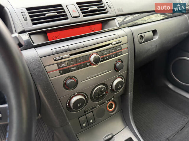 Черный Мазда 3, объемом двигателя 1.6 л и пробегом 189 тыс. км за 4300 $, фото 12 на Automoto.ua