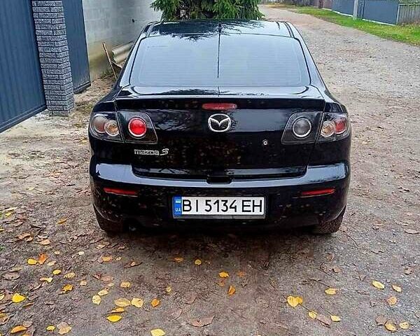 Черный Мазда 3, объемом двигателя 2 л и пробегом 240 тыс. км за 5600 $, фото 2 на Automoto.ua