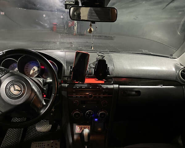 Чорний Мазда 3, об'ємом двигуна 1.6 л та пробігом 257 тис. км за 5100 $, фото 13 на Automoto.ua