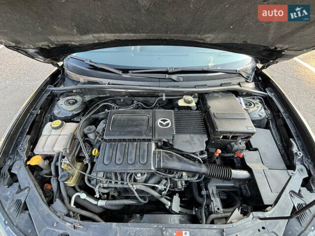 Чорний Мазда 3, об'ємом двигуна 1.6 л та пробігом 230 тис. км за 6600 $, фото 20 на Automoto.ua