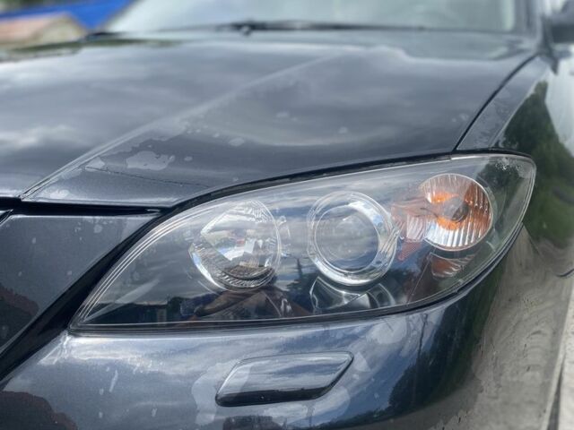 Чорний Мазда 3, об'ємом двигуна 1.6 л та пробігом 225 тис. км за 5199 $, фото 1 на Automoto.ua