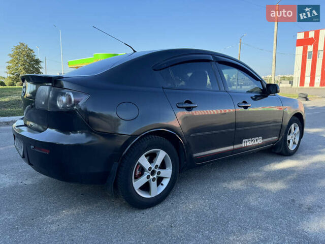 Черный Мазда 3, объемом двигателя 2 л и пробегом 150 тыс. км за 5999 $, фото 19 на Automoto.ua