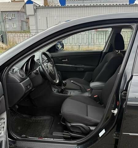 Черный Мазда 3, объемом двигателя 1.6 л и пробегом 175 тыс. км за 4700 $, фото 2 на Automoto.ua