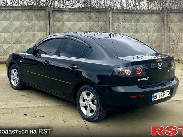 Чорний Мазда 3, об'ємом двигуна 1.6 л та пробігом 178 тис. км за 6100 $, фото 7 на Automoto.ua