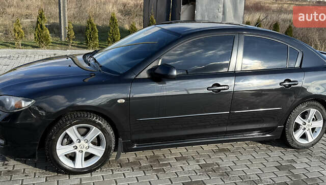 Черный Мазда 3, объемом двигателя 2 л и пробегом 154 тыс. км за 5500 $, фото 1 на Automoto.ua