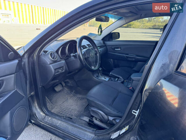 Черный Мазда 3, объемом двигателя 2 л и пробегом 150 тыс. км за 5999 $, фото 22 на Automoto.ua