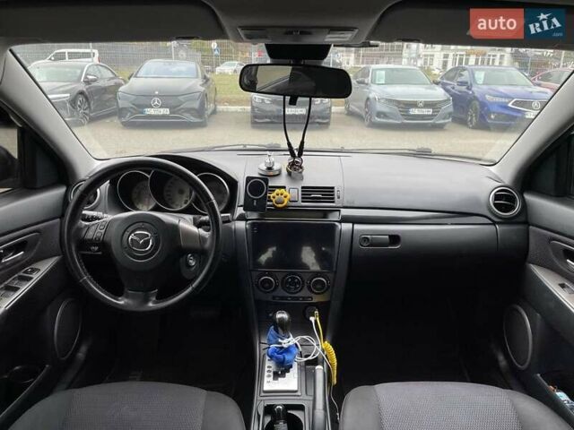 Чорний Мазда 3, об'ємом двигуна 1.6 л та пробігом 223 тис. км за 6490 $, фото 13 на Automoto.ua