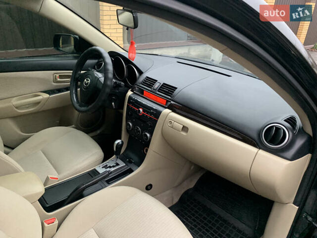 Черный Мазда 3, объемом двигателя 1.6 л и пробегом 200 тыс. км за 4999 $, фото 23 на Automoto.ua