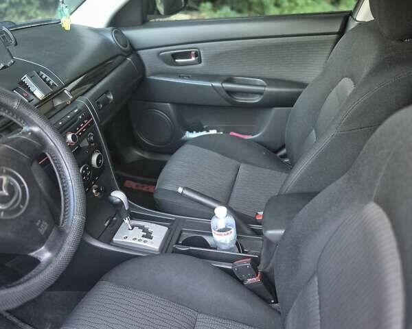 Чорний Мазда 3, об'ємом двигуна 1.6 л та пробігом 168 тис. км за 5600 $, фото 13 на Automoto.ua