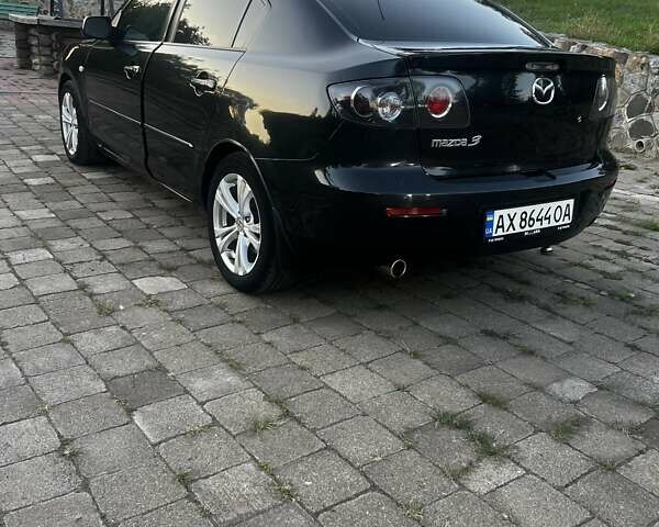 Черный Мазда 3, объемом двигателя 2 л и пробегом 330 тыс. км за 5000 $, фото 3 на Automoto.ua