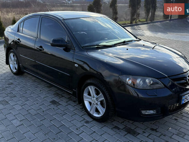 Черный Мазда 3, объемом двигателя 2 л и пробегом 154 тыс. км за 5500 $, фото 2 на Automoto.ua