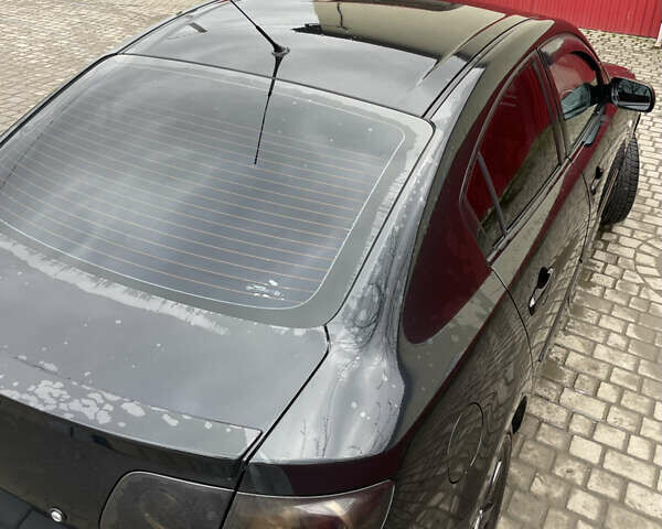 Черный Мазда 3, объемом двигателя 1.6 л и пробегом 189 тыс. км за 4500 $, фото 12 на Automoto.ua