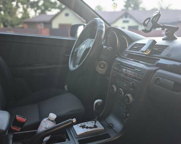 Чорний Мазда 3, об'ємом двигуна 1.6 л та пробігом 168 тис. км за 5600 $, фото 5 на Automoto.ua