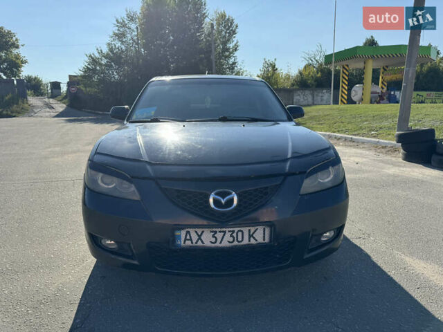 Черный Мазда 3, объемом двигателя 2 л и пробегом 150 тыс. км за 5999 $, фото 7 на Automoto.ua