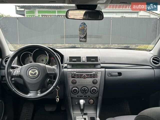 Черный Мазда 3, объемом двигателя 1.6 л и пробегом 180 тыс. км за 5700 $, фото 34 на Automoto.ua