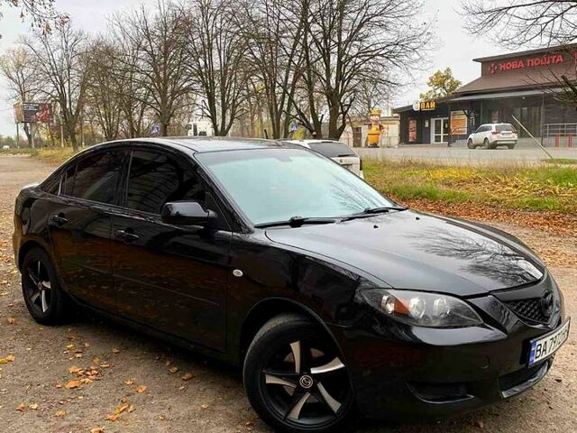 Чорний Мазда 3, об'ємом двигуна 1.6 л та пробігом 289 тис. км за 4600 $, фото 7 на Automoto.ua