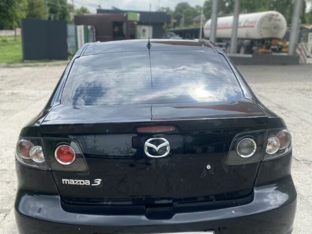 Чорний Мазда 3, об'ємом двигуна 1.6 л та пробігом 225 тис. км за 5199 $, фото 3 на Automoto.ua