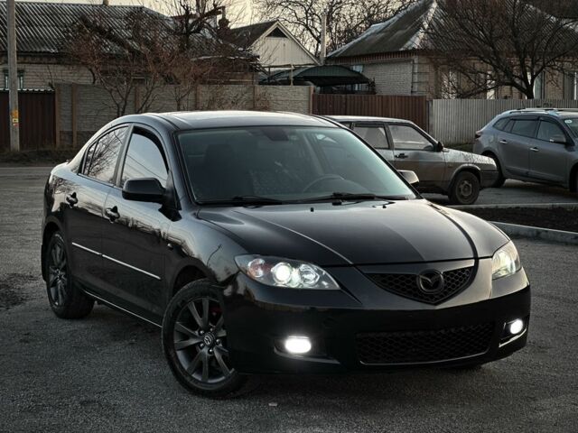 Черный Мазда 3, объемом двигателя 1.6 л и пробегом 290 тыс. км за 4400 $, фото 3 на Automoto.ua