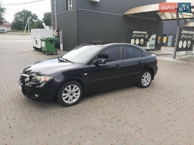 Черный Мазда 3, объемом двигателя 1.6 л и пробегом 183 тыс. км за 5800 $, фото 5 на Automoto.ua