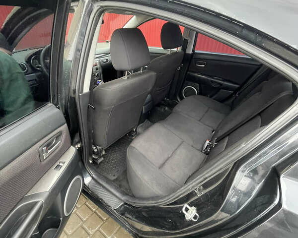 Черный Мазда 3, объемом двигателя 1.6 л и пробегом 189 тыс. км за 4500 $, фото 16 на Automoto.ua