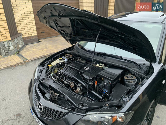 Черный Мазда 3, объемом двигателя 1.6 л и пробегом 200 тыс. км за 4999 $, фото 28 на Automoto.ua