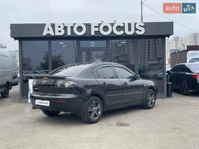 Чорний Мазда 3, об'ємом двигуна 1.6 л та пробігом 223 тис. км за 6490 $, фото 6 на Automoto.ua