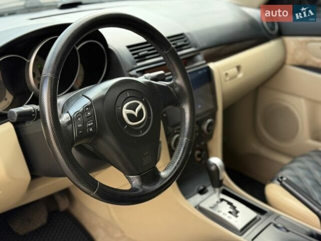 Чорний Мазда 3, об'ємом двигуна 1.6 л та пробігом 268 тис. км за 5750 $, фото 12 на Automoto.ua