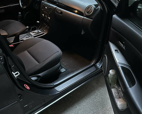 Чорний Мазда 3, об'ємом двигуна 1.6 л та пробігом 177 тис. км за 6100 $, фото 9 на Automoto.ua
