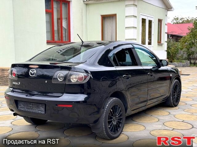 Чорний Мазда 3, об'ємом двигуна 1.6 л та пробігом 201 тис. км за 5900 $, фото 5 на Automoto.ua