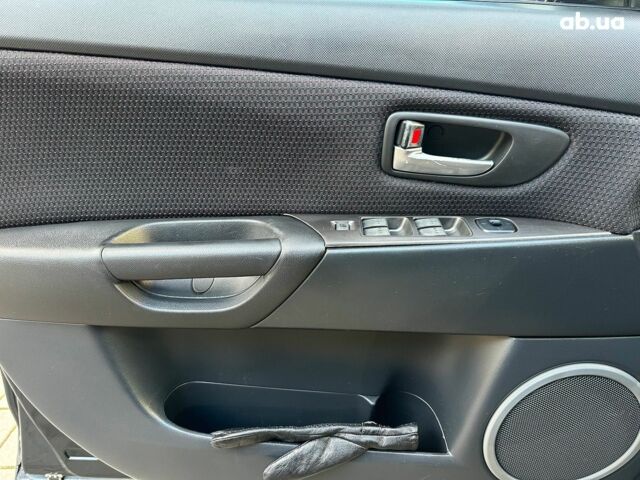 Чорний Мазда 3, об'ємом двигуна 1.6 л та пробігом 232 тис. км за 6740 $, фото 21 на Automoto.ua