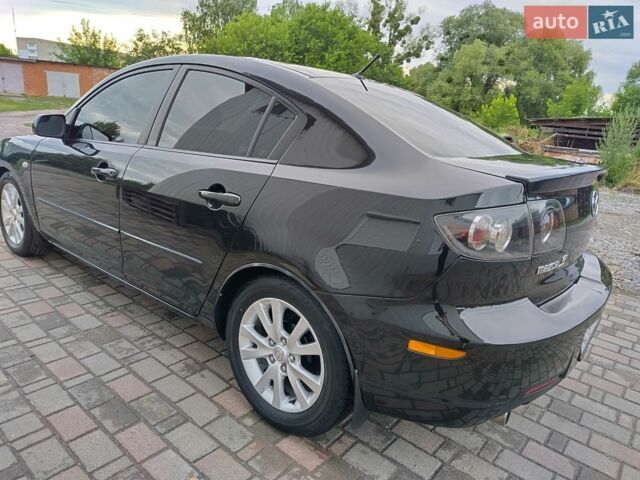 Чорний Мазда 3, об'ємом двигуна 1.6 л та пробігом 176 тис. км за 7500 $, фото 9 на Automoto.ua